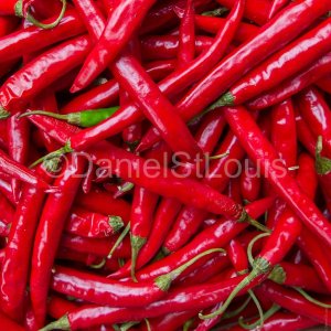 Red peppers in a group.