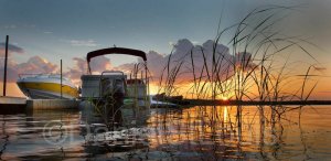Boat sunset at the village of gagetown nb.